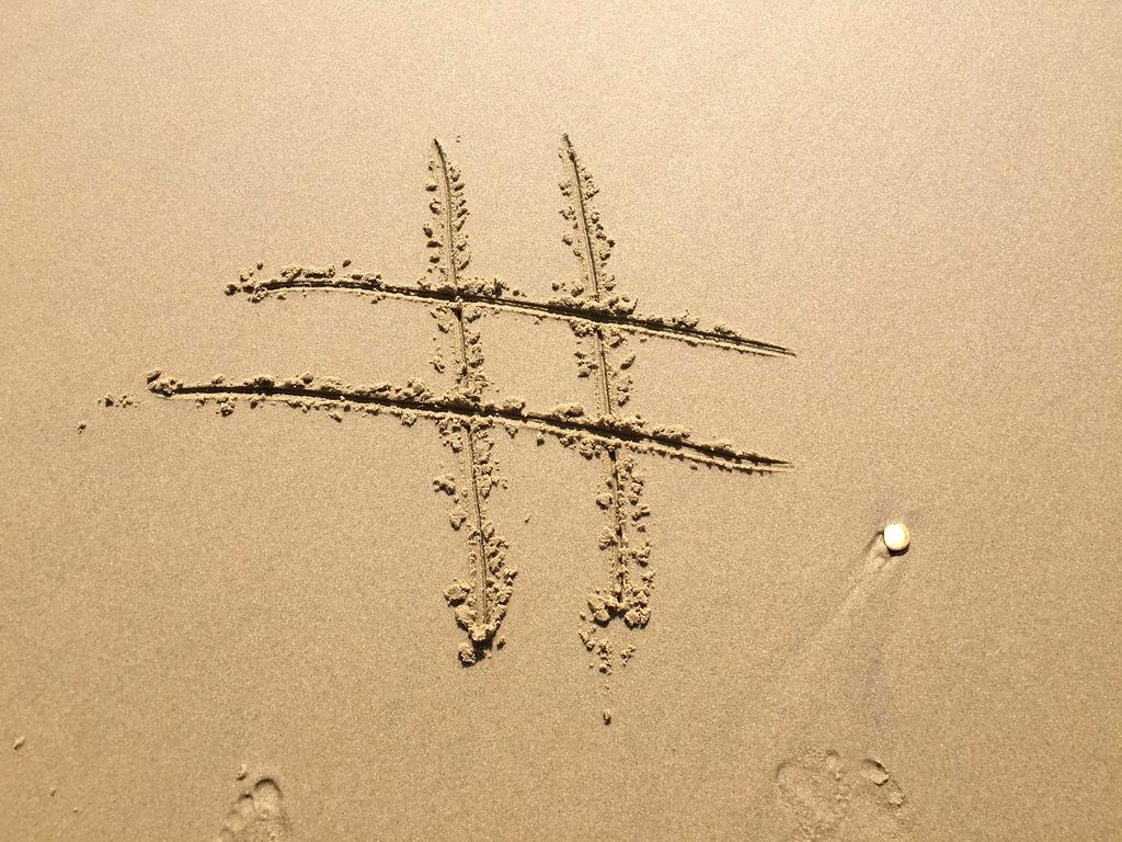 Team collaborating on AI hashtag technology