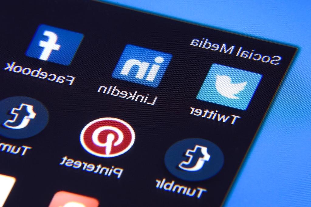Multi-platform social media strategy showing different platform interfaces and optimization
